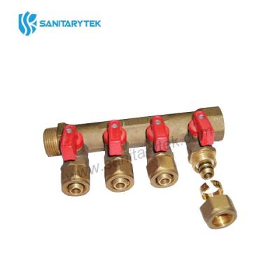 Brass manifold with ball valve with compression exits for multilayer pipe